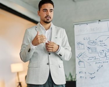 Group,Of,Young,Business,People,Having,A,Meeting,Or,Presentation